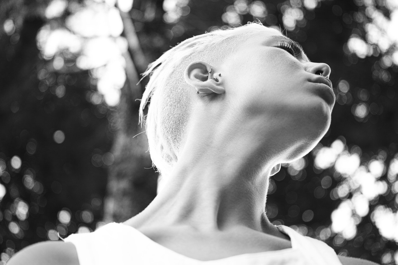 White and black picture of woman's neck