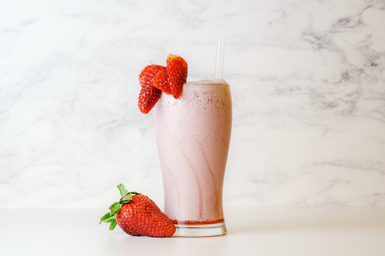 Strawberry protein shake with strawberries